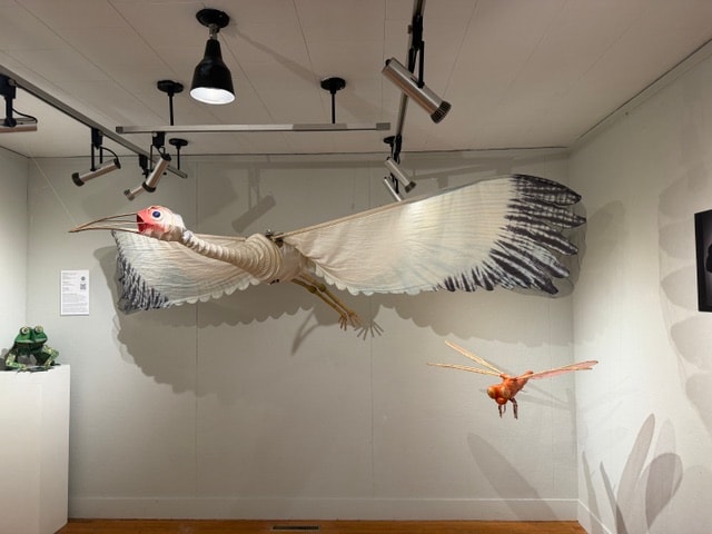 Large sculptural bird figures suspended from ceiling — Kent CT Puppetry Exhibit
